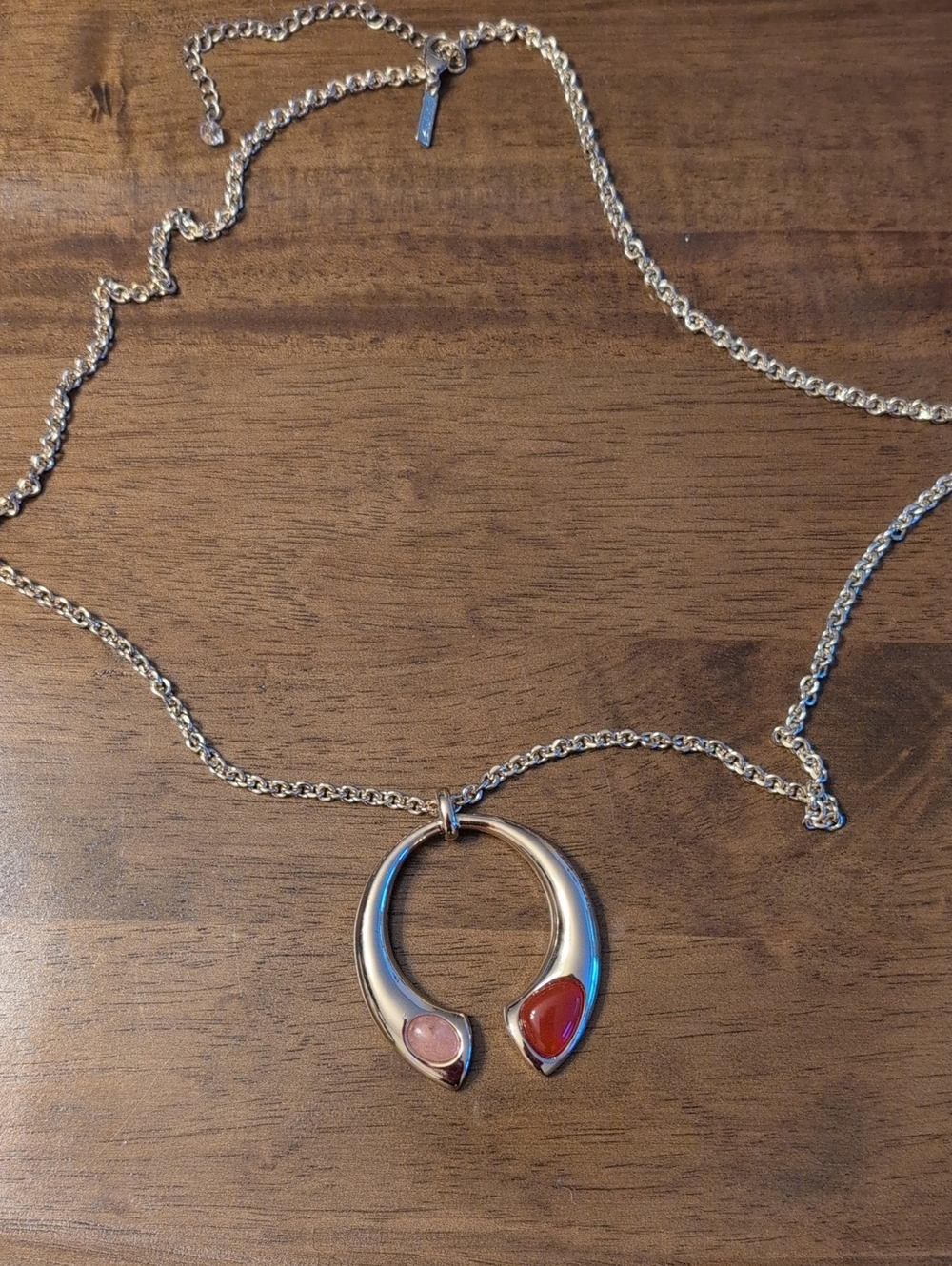 White House Black Market Gold Crescent Necklace with Red and Pink Stones